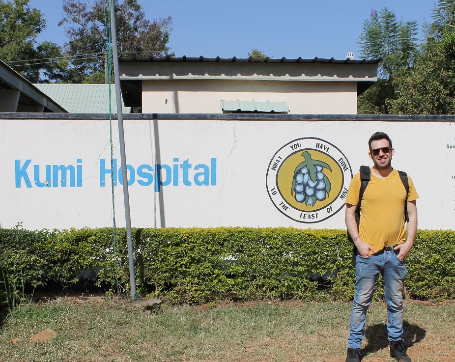 A Rambam volunteer at the entrance to Kumi Hospital in Uganda