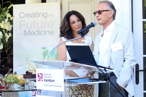 A couple hosting an American Friends of Rambam garden reception