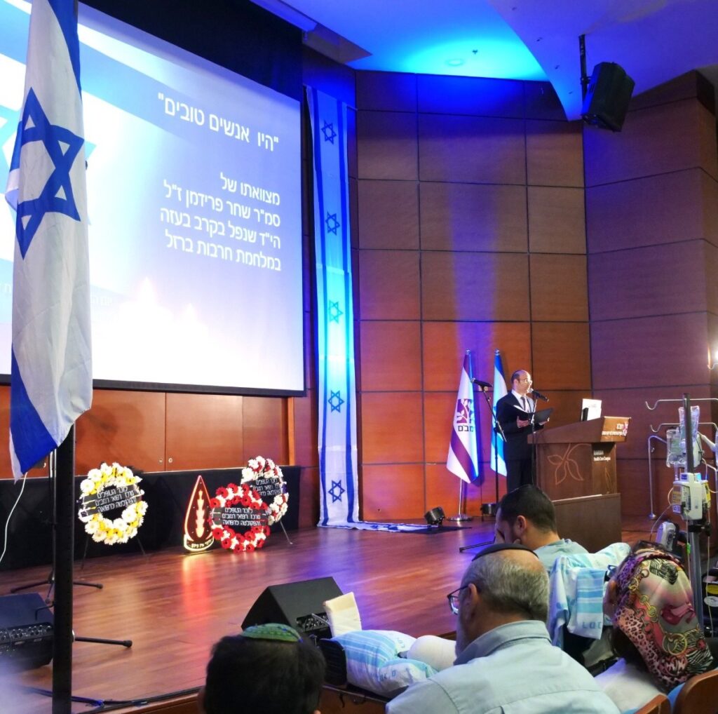 Despite Their Injuries, Wounded Soldiers Take Part in Memorial Day Ceremony