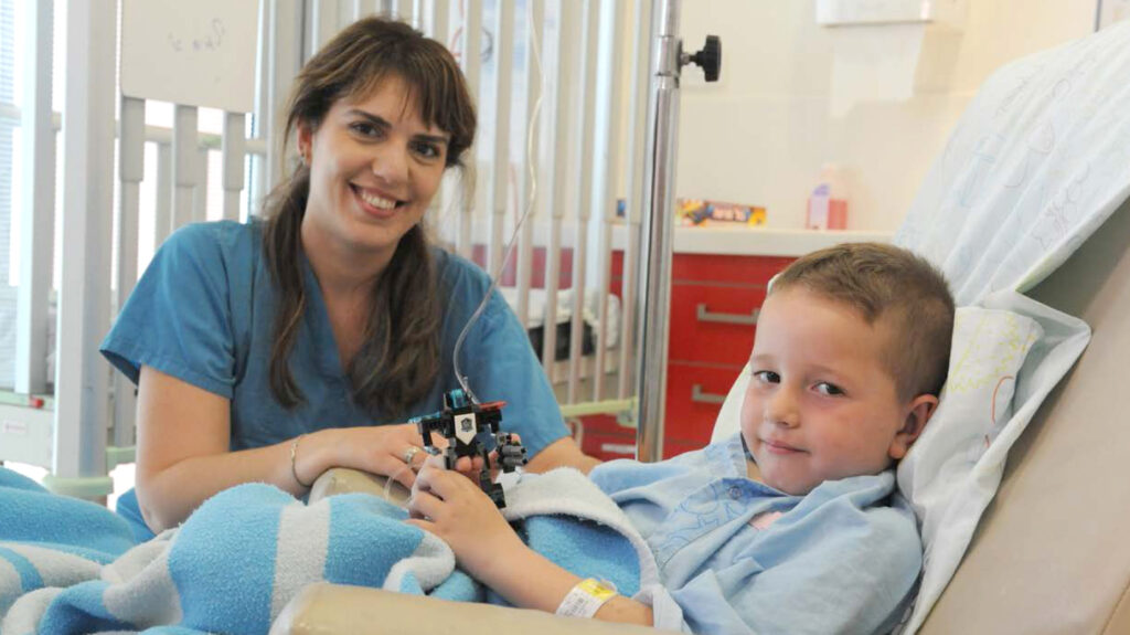 A Rambam nurse with a young patient